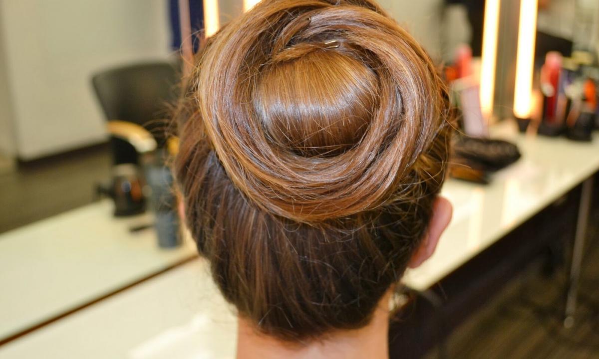 Simple hairstyle on average hair the hands